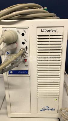 Lot of 2 Spacelabs Patient Monitors Ultraview SL - S/W 2.03.07/2.00.05 w/ Spacelabs central units Ultraview SL/SL2800 including module ECG/SPO2/TI2 and ECG hoses and SPO2 hoses and Cuffs (Both power up) - 5