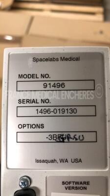 Lot of 2 Spacelabs Patient Monitors Ultraview SL - S/W 2.03.07/2.00.05 w/ Spacelabs central units Ultraview SL/SL2800 including module ECG/SPO2/TI2 and ECG hoses and SPO2 hoses and Cuffs (Both power up) - 12