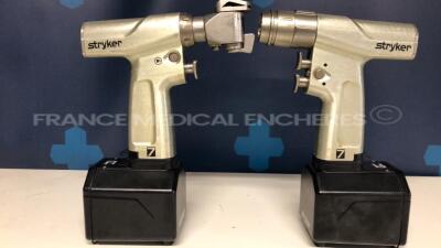 Lot of 1 Stryker Orthopedic Motor System 7 Sagittal Saw 7208 and 1 Stryker Orthopedic Motor System 7 SingleTrigger Rotary drill 7205 including 2 Stryker Aseptic Housing Battery 7126-120-000