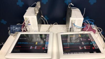 Lot of 2 Spacelabs Patient Monitors Ultraview SL - S/W 2.00.05 w/ Spacelabs central units Ultraview SL/SL including module ECG/SPO2/TI2 and ECG hoses and SPO2 hoses and Cuffs (Both power up)