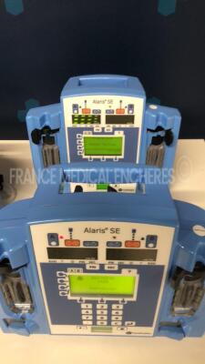 Lot of 5 Carefusion Dual Channel Infusion Pumps Alaris SE 7231 - 2 YOM 2013 - 1 YOM 2007 - 1 YOM 2006 - 1 YOM 2005 - S/W 02.80 - no power cables (All power up) - 6