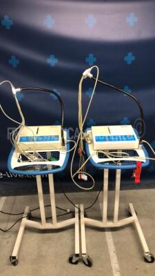 Lot of 2 Schiller ECG AT1 - w/ ECG electrodes and trolleys (Both power up)