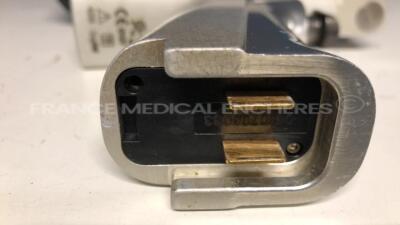 Lot of 1 Stryker Orthopedic Motor System 5 Sagittal Saw 4208 and 1 Stryker Orthopedic Motor System 5 Single Trigger Rotary drill 4205 including 2 Stryker Aseptic Housing Batteries 4126-120 and Stryker Drill 4103-131 and Stryker Reamer 4103-210 - 7