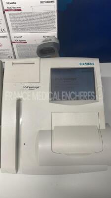 Lot of 2 Siemens Multi Parameter Analyzers for glycemic control DCA Vantage - S/W 4.4.0.0 - w/ barcode scanner - 10 boxes of 10 reagent kits DCA system hemoglobin A1c expiration date 04/2023 (Powers up) - 3