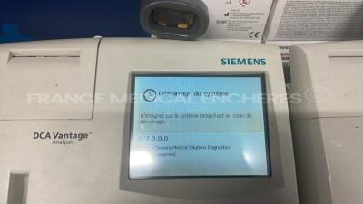 Lot of 2 Siemens Multi Parameter Analyzers for glycemic control DCA Vantage - S/W 4.4.0.0 - w/ barcode scanner - 10 boxes of 10 reagent kits DCA system hemoglobin A1c expiration date 04/2023 (Powers up) - 6