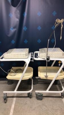 Lot of 2 ¨Philips ECG Pagewriter 100 M1772A - w/ ECG electrodes and trolleys (Both power up) - 2