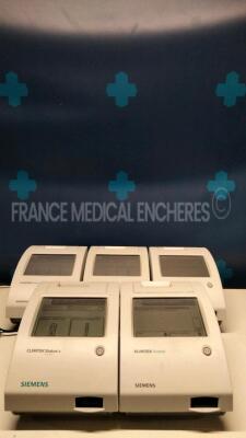 Lot of 4 Siemens Urine Analysers Clinitek Status and 1 Siemens Urine Analyser Clinitek Status + - S/W 2.500.001, 2.400.003, 2.400.002, 2.500.002, and 2.000.022 - No power supplies (All power up)