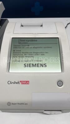 Lot of 4 Siemens Urine Analyzers Clinitek Status - S/W 2.200.007/2.200.007/2.200.007/2.200.007 - w Siemens reagent strips for urinalysis Multistix 8SG - paper roll (All power up) - 4