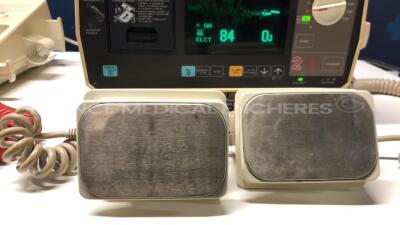 Lot of 1 x Nihon Kohden Defibrillator Cardiolife TEC-7100F and 1 x Hellige Defibrillator Defiport FCP912 (Both power up) - 7