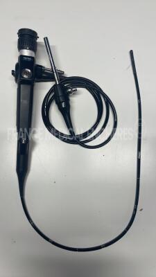 Pentax Fiber Bronchoscope FB-15V - Engineer's report : Optical system several dots on image ,Angulation no fault found , Insertion tube little pinch , Light transmission no fault found , Channels no fault found, Leak check no fault found