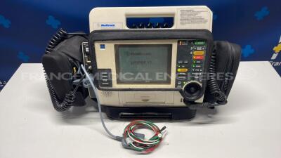 Medtronic Defibrillator Lifepak 12 - YOM 2003 - S/W 3011371-134 user test passed w/ ECG leads and cuff (Powers up)