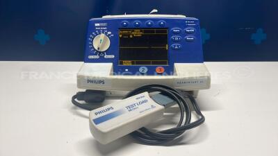 Philips Defibrillator Hearstart XL - YOM 2002 - missing paddels - french language - no power cable (Powers up)