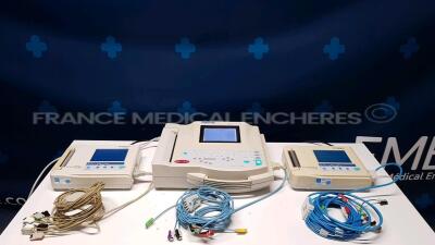 Lot of 2 x Fukuda Denshi ECG FX -7202 with ECG leads and 1 x GE ECG MAC 1200ST with ECG leads - no power cables (All power up)