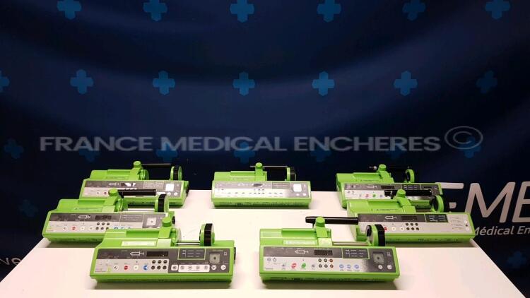 Lot of 7 x Fresenius Syringe Pumps including 4 x Pilote C - 1 x Pilote A - 2 x Pilote - no power cables (All power up)