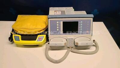 Lot of 1 x Bruker Defibrillator Defigard 3002 IH (No power) and 1 x Schiller Defibrillator FredBI untersted du to the missing battery charger