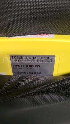 Lot of 1 x Bruker Defibrillator Defigard 3002 IH (No power) and 1 x Schiller Defibrillator FredBI untersted du to the missing battery charger - 6