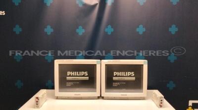 Lot of 2 Philips Patient Monitors MP70 - YOM 2006 - S/W 4.00 - w/ 2 Philips Module M3001A - YOM 2006 ( Both power up)