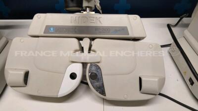 Lot of 1 x Nidek Auto Non Contact Tonometer NT-3000 - YOM 2002 (Powers up) and 1 x Nidek Auto Refractor Keratometer ARK-700A - YOM 2002 (Powers up) and 1 x Nidek Refractor RT-2100 - YOM 2001 (Untested) and Nidek Auto Chart Projector - YOM 2002 (Untested) - 4