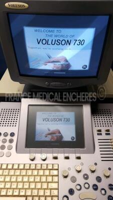 GE Ultrasound Voluson 730 - YOM 11/2005 - S/W 5.4.3 monitor holder to be repaired - Options 4D real time - DICOM - vocal 2 - SRI 2 - VCI - STIC - XTD TD w/ Mitsubishi Printer P93 (Powers up) - 2