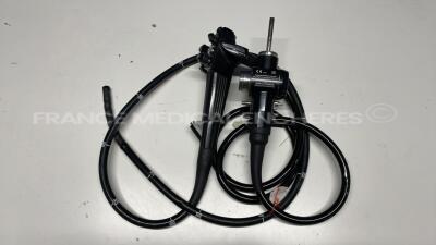 Olympus Colonoscope CF Q145l - Engineer's report : Optical system dark dot on image ,Angulation no fault found , Insertion tube no fault found , Light transmission no fault found , Channels no fault found, Leak no leak buttons to be changed - leak in su