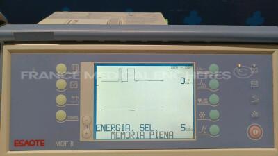 Lot of 1 x Nihon Kohden Defibrillator TEC-7300K and 1 x GE Defibrillator Responder 2000 - YOM 2009 - S/W v2.41 - w/ SPO2 Sensor and 1 x Schiller Defibrillator Defigard 3002IH (All power up) *3201804/40233033/20719* - 8