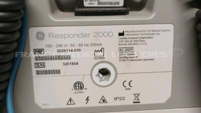 Lot of 1 x Nihon Kohden Defibrillator TEC-7300K and 1 x GE Defibrillator Responder 2000 - YOM 2009 - S/W v2.41 - w/ SPO2 Sensor and 1 x Schiller Defibrillator Defigard 3002IH (All power up) *3201804/40233033/20719* - 12