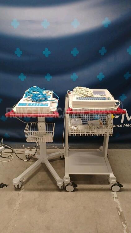 Lot of 2x Schiller ECG AT-1 w/ ECG Sensors and 1x Schiller ECG AT-102 w/ ECG Sensors (All power up)