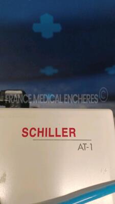 Lot of 2x Schiller ECG AT-1 w/ ECG Sensors and 1x Schiller ECG AT-102 w/ ECG Sensors (All power up) - 5