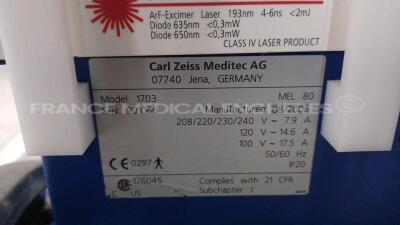 Lot of 1 x Zeiss Excimer Laser MEL 80 1703 - YOM 2005 - S/W 2.0.2 - w/ Zeiss Surgical Microscope - Binoculars 10x/f170 -System monitor needs to be repaired (Powers up) and 1 x Arkus Examination Table LS Comfort 1275-957 - YOM 2004 - w/ Remote control (No - 16