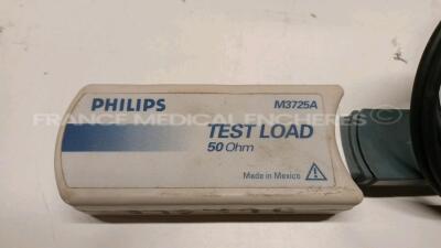 Lot of 2x Philips Defibrillators Heartstart MRX - YOM 2010/2007 w/ 1x Philips Test Load M3725A - missing paddles and power cables (Both power up) - 4