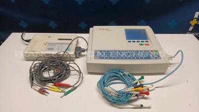 Lot of 1 x Schiller ECG AT-102 with ECG leads and 1 x Fukuda Denshi FCP-2155 with ECG leads (Both power up) *07289/33143525*