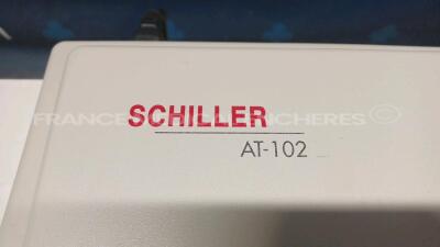 Schiller ECG AT-102 - YOM 2009 - w/ ECG leads (Powers up) *07005891* - 3