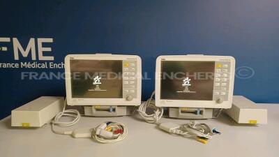 Lot of 2 x Drager Patient Monitors Infinity Delta XL - YOM 2006 - S/W VF8.4-W - French Language - w/ 2 x Drager Monitor Docking Stations and 2 x Power Supplies and 2 x ECG Leads and 2 x SPO2 Sensors (Both Power Up - Damaged - Light Scratches - See Picture