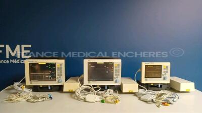 Lot of 2 x Siemens/Drager Patient Monitors SC 7000 - YOM 2002/2000 and 1 x Siemens Patient Monitor SC 6002 XL - YOM 2000 - w/ 3 x Drager/Siemens Monitor Docking Stations and 3 x Power Supplies and 3 x ECG Leads and 3 x SPO2 Sensors (All Power Up - Damaged