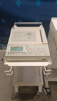 Lot of 2x Agilent ECG PageWriter 200 and 1x Schiller Stress System CS200 (All power up) *us00501397/03002097/us00502257* - 2