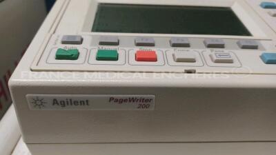 Lot of 2x Agilent ECG PageWriter 200 and 1x Schiller Stress System CS200 (All power up) *us00501397/03002097/us00502257* - 5