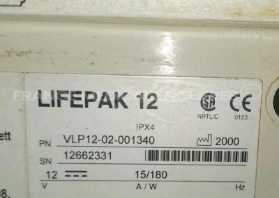 Medtronic Physio-Control Monitor/Defibrillator LIFEPAK 12 - YOM 2000 - S/W 3011371-067 - User Test Passed - Options - Pacer, CO2, SPO2, PNI, ECG, Auxiliary Power and Printer needs to be repaired - w/ Paddles and 1 x Carry Case - No Batteries included (Pow - 11