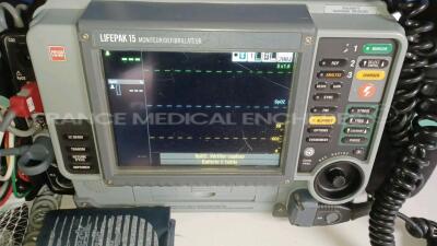 Medtronic Physio-Control Monitor/Defibrillator LIFEPAK 15 - YOM 2009 - S/W 3207410-007 - User Test Passed - Options - Pacer, CO2, SPO2, NIBP, ECG, Auxiliary Power and Printer - w/ Paddles and 2 x Physio-Control Li-ion Rechargeable Batteries and 1 x Carry - 2