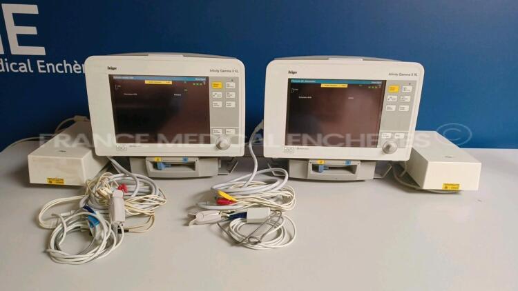 Lot of 4 x Drager Patient Monitors Infinity Gamma XXL - YOM 2007 - S/W VF7.3-W - French Language - w/ 4 x Drager Monitor Docking Stations and 4 x Power Supplies and 4 x ECG Leads and 2 x SPO2 Sensors (Both Power Up - Damaged - See Pictures) *5398651163/53