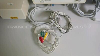 Lot of 4 x Drager Patient Monitors Infinity Gamma - YOM 2006 - S/W VF6.1-W - French Language - w/ 4 x Drager Monitor Docking Stations and 4x Power Supplies and 4 x ECG Leads and 4 x SPO2 Sensors (Both Power Up - Light Scratches - See Pictures) *5514181673 - 6