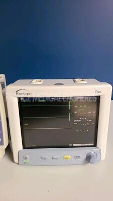 Lot of 1 x Nihon Kohden Beside Monitor BSM-2301K -YOM 2010 and 1 x Datascope Patient Monitor Trio damaged see picture (Both power up) *36414/09980006004009F* - 2