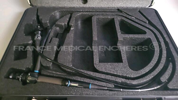 Olympus Bronchoscope BF-PE2 Engineer's report : Optical system 50 black dots ,Angulation no fault found , Insertion tube no fault found , Light transmission no fault found , Channels no fault found , Leak no fault found no distal sheath *2302962*