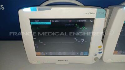 Lot of 2 x Philips Patient Monitors Intellivue Cardiac MP50 - YOM 2010 - S/W K.21.42 - French Language - w/ 2 x Philips Modules M3001A - YOM 2010 (Both powers up - Light Scratches - See Pictures) *DE82078355/DE82078333/DE907V8692/DE907V8697* - 2