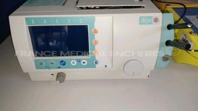 Lot of 1 x Philips Patient Monitor M304A - YOM 2003 and 1 x Atys Medical Ultrasonic Blood Flow Detector BASIC and 1 x Schiller Defibrillator FRED (No Power - Damaged - For spare parts - See Pictures) *110600/48415575* - 3