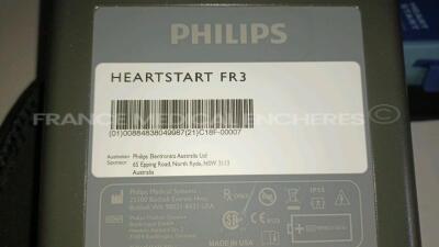 Lot of 2 x Philips Medical Defibrillators Heartstart FR3 - w/ 1 x Philips Battery and 1 x Philips Defibrillator Heartstart FR2+ w/ 1 x Philips Battery (All power up - French Language) *C18F-00007/C16I-00237/0908288370* - 6