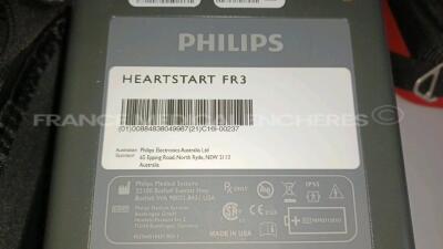 Lot of 2 x Philips Medical Defibrillators Heartstart FR3 - w/ 1 x Philips Battery and 1 x Philips Defibrillator Heartstart FR2+ w/ 1 x Philips Battery (All power up - French Language) *C18F-00007/C16I-00237/0908288370* - 9