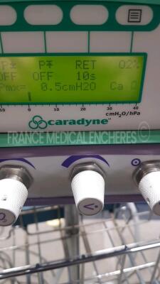 Lot of 1 x Datascope Vital Signs Monitor Trio (Powers up) and 1 x Welch Allyn Vital Signs Monitor Propaq Encore 202 EL (no power) and 1 x Caradyne Oxygen Respiratory Monitor including Whisper Flow 2 (Powers up) *DA016093/MC16145E6/820060085* - 5