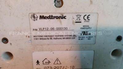 Medtronic/Physio-Control Defibrillator/Monitor Lifepak 12 - YOM 2009 - S/W 3011371-134 - User Test Passed - Multilingual Device - Missing Paddles - w/ 1 x Battery Charger - YOM 2009 and 1 x ECG Leads and 1 x SPO2 Sensors and 1 x Cuff (Powers up - Slight S - 17