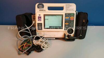 Medtronic/Physio-Control Defibrillator/Monitor Lifepak 12 - YOM 2008 - S/W 3011371-134 - User Test Passed - Multilingual Device - Missing Paddles - w/ 1 x ECG Leads and 1 x SPO2 Sensors (Powers up - Slight Scratches - Batteries not included - See Pictures