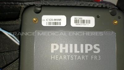 Lot of 3 x Philips Medical Defibrillators Heartstart FR3 - w/ 3 x Philips Batteries (All power up - French Language) *C12G-00404/C12I-00185/C12I-00105* - 6